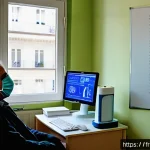 Home 20 폐 기능 검사와 진단 가능한 질환 - A modern French pulmonologist’s office with a middle-aged French patient undergoing spirometry testi...